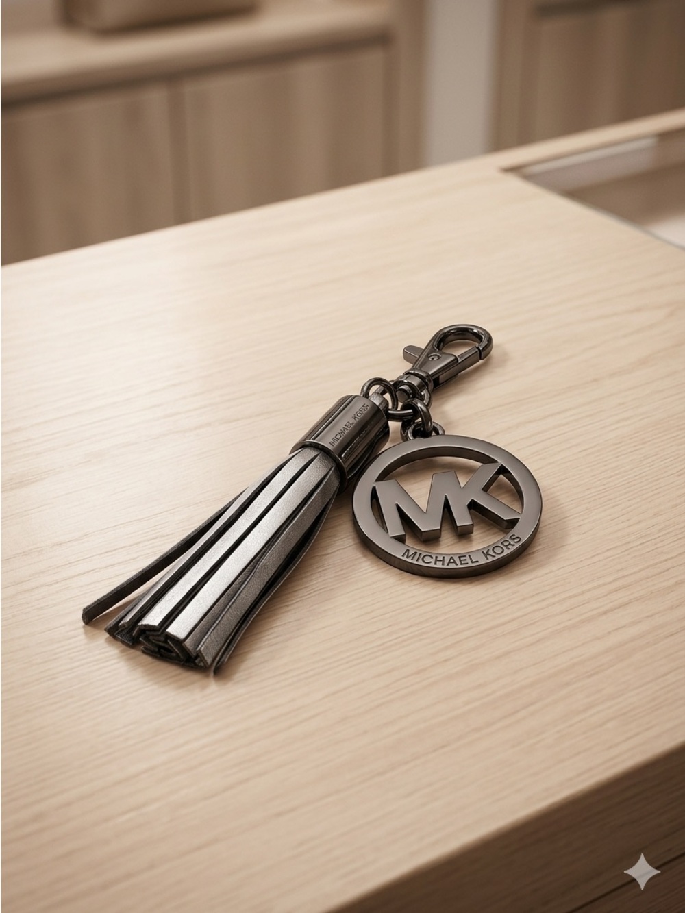 Michael Kors Men’s Gunmetal Tassel Key Fob with MK Logo